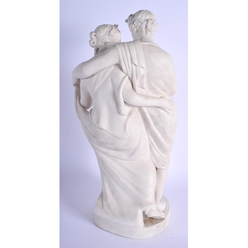 299C - A LARGE 19TH CENTURY EUROPEAN PARIAN WARE PORCELAIN FIGURE OF LOVERS modelled upon a circular base. ... 