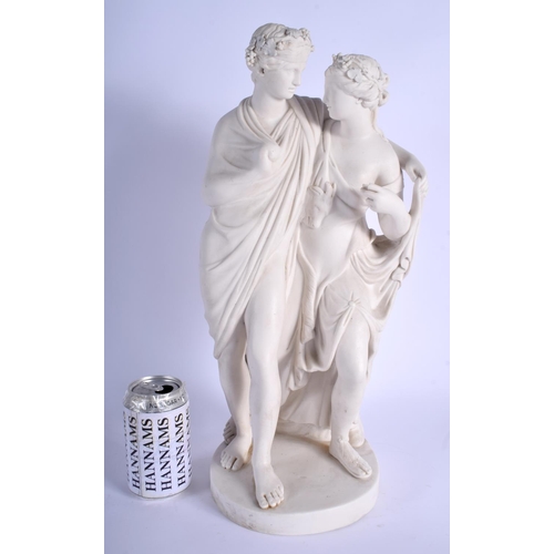 299C - A LARGE 19TH CENTURY EUROPEAN PARIAN WARE PORCELAIN FIGURE OF LOVERS modelled upon a circular base. ... 