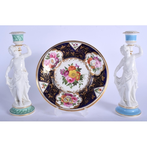 299F - A PAIR OF 19TH CENTURY EUROPEAN PORCELAIN CANDLESTICKS together with a Derby or Coalport stand, mode... 