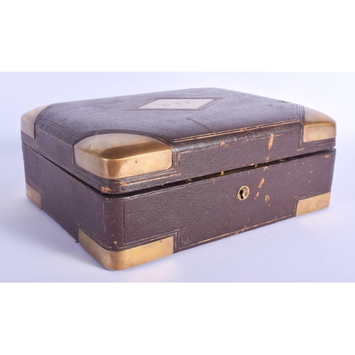 302 - A 19TH CENTURY FRENCH BRASS MOUNTED LEATHER VANITY CASE Louis Dujat, Palais Royal. 26 cm x 21 cm.