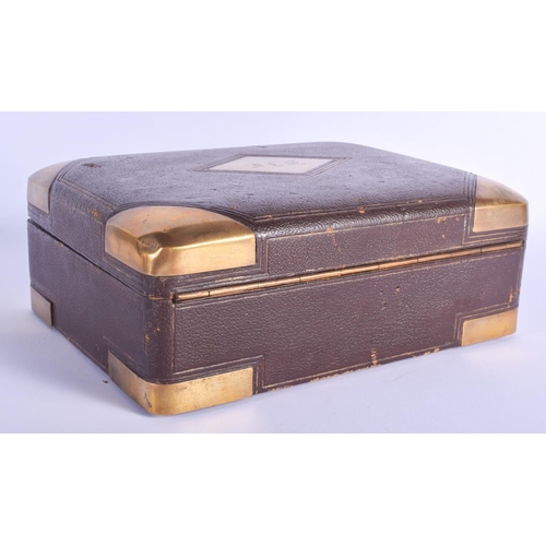 302 - A 19TH CENTURY FRENCH BRASS MOUNTED LEATHER VANITY CASE Louis Dujat, Palais Royal. 26 cm x 21 cm.