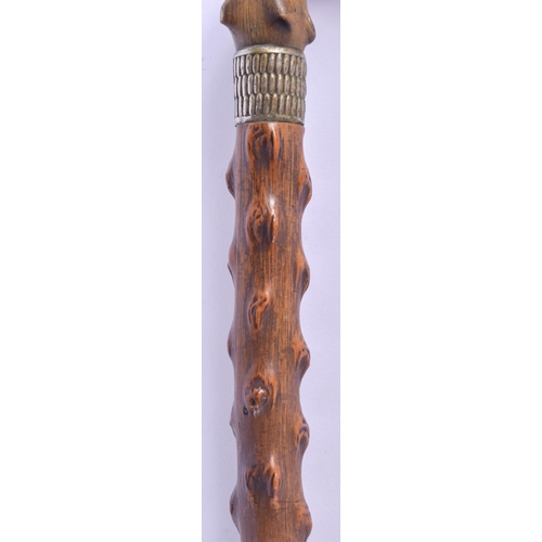 309 - A 19TH CENTURY CONTINENTAL CARVED RHINOCEROS HORN WALKING CANE. 80 cm long.