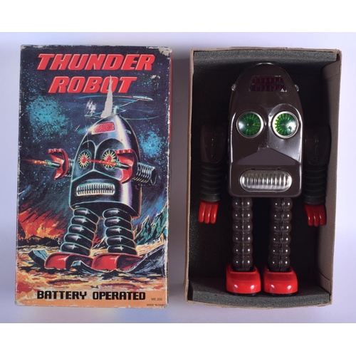 322 - A BOXED BATTERY OPERATED THUNDER ROBOT. 24 cm high.