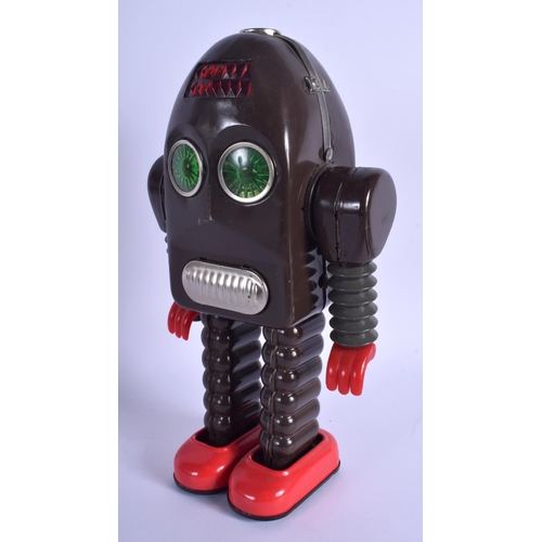 322 - A BOXED BATTERY OPERATED THUNDER ROBOT. 24 cm high.