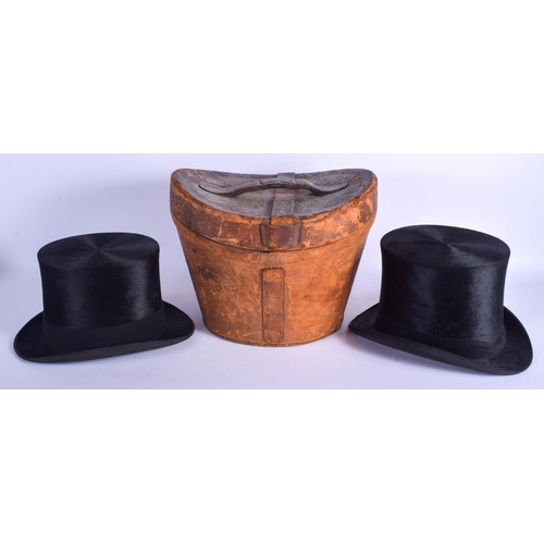 337 - A VINTAGE WALTER BARNARD & SON TOP HAT together with a cased top hat. 

Walter Barnard internal head... 