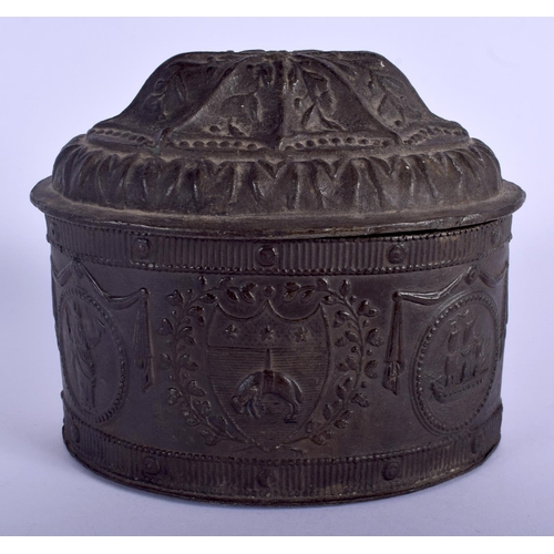 341 - A GEORGE III LEAD TOBACCO BOX AND COVER decorated with various armorial shields. 15 cm x 13 cm.