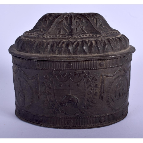 341 - A GEORGE III LEAD TOBACCO BOX AND COVER decorated with various armorial shields. 15 cm x 13 cm.