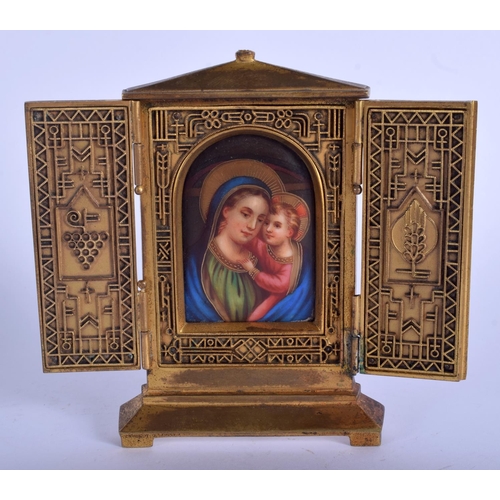 345 - A 19TH CENTURY EUROPEAN BRONZE AND PORCELAIN FOLDING ICON painted with a view of Madonna and child. ... 