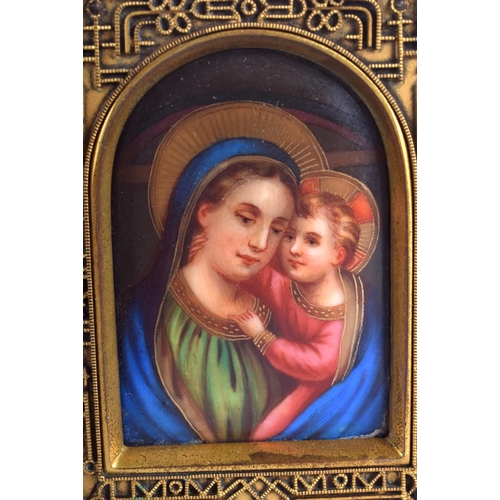 345 - A 19TH CENTURY EUROPEAN BRONZE AND PORCELAIN FOLDING ICON painted with a view of Madonna and child. ... 