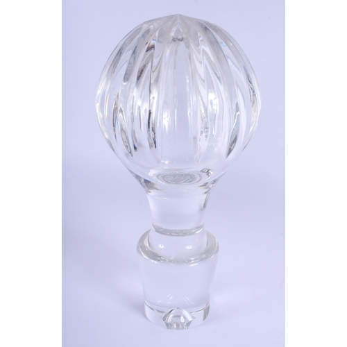 41 - A VERY LARGE CRYSTAL CUT GLASS DECANTER AND STOPPER decorated with star shaped motifs. 57 cm x 20 cm... 