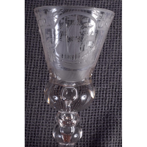 42 - THREE 18TH CENTURY CONTINENTAL WINE GLASSES with engraved cartouches. Largest 18 cm high. (3)