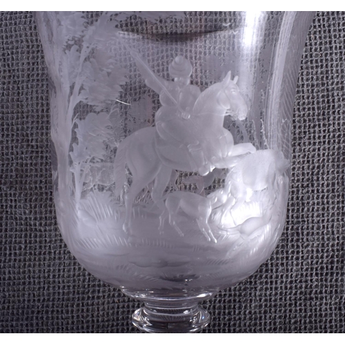 43 - A GOOD LARGE ANTIQUE CRYSTAL GLASS GOBLET engraved with hunting scenes. 27 cm high.