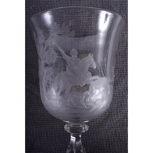 43 - A GOOD LARGE ANTIQUE CRYSTAL GLASS GOBLET engraved with hunting scenes. 27 cm high.