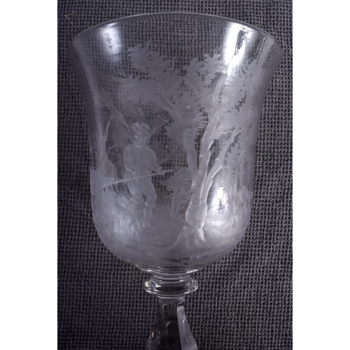 43 - A GOOD LARGE ANTIQUE CRYSTAL GLASS GOBLET engraved with hunting scenes. 27 cm high.