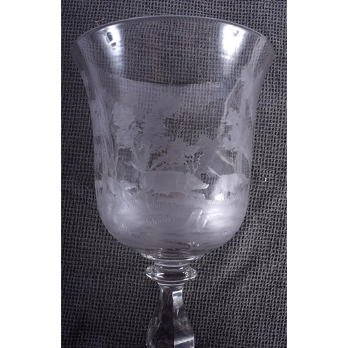 43 - A GOOD LARGE ANTIQUE CRYSTAL GLASS GOBLET engraved with hunting scenes. 27 cm high.