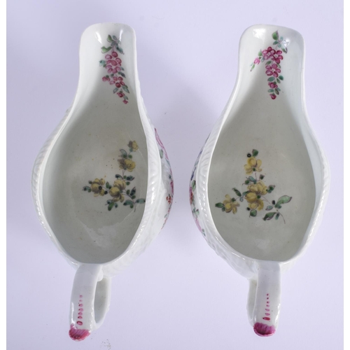 61 - A PAIR OF 18TH CENTURY ENGLISH PORCELAIN SAUCE BOATS probably Worcester, painted with flowers on a r... 