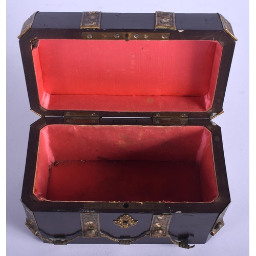 740 - A 19TH CENTURY FRENCH GILT MOUNTED EBONISED BOX decorated with foliage. 17 cm x 11 cm.