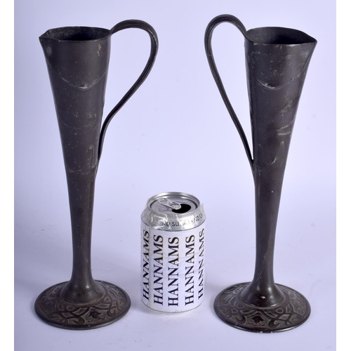 743 - A PAIR OF FRENCH ART NOUVEAU PEWTER VASES by Jean Maurice Petizon. 32 cm high.