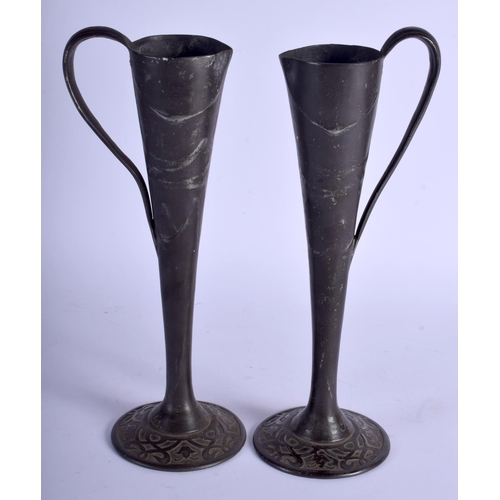 743 - A PAIR OF FRENCH ART NOUVEAU PEWTER VASES by Jean Maurice Petizon. 32 cm high.