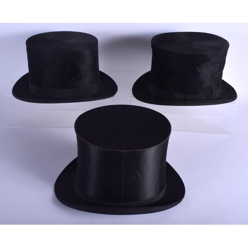 746 - TWO VINTAGE TOP HATS and a folding top hat. (3)