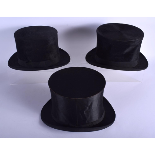 746 - TWO VINTAGE TOP HATS and a folding top hat. (3)