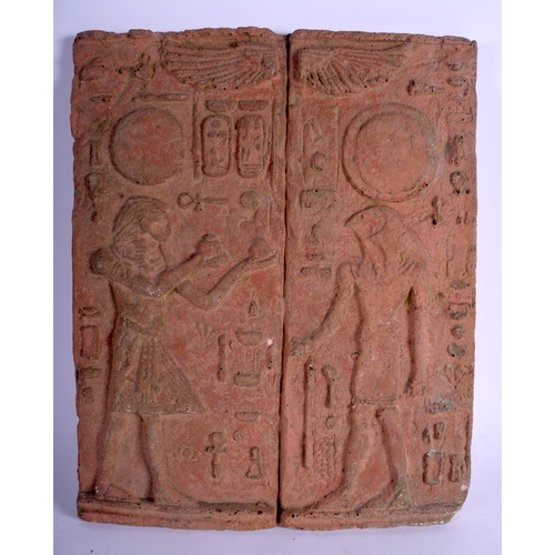 748 - A 19TH CENTURY EGYPTIAN REVIVAL TERRACOTTA PANEL decorated with figures and hieroglyphics 36 cm x 25... 