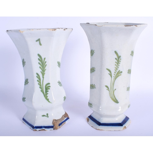 82 - A PAIR OF 19TH CENTURY EUROPEAN DELFT FAIENCE VASES painted with figures and deer. 23 cm x 10 cm.