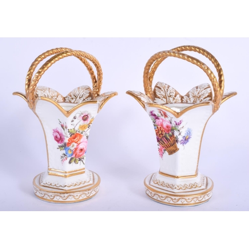 93 - A PAIR OF 19TH CENTURY ENGLISH PORCELAIN BASKET VASES painted with flowers and baskets. 15 cm high.