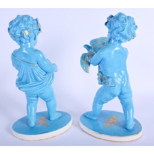 94 - A PAIR OF 19TH CENTURY CONTINENTAL TURQUOISE GLAZED FIGURES Minton or Sevres. 25.5 cm high.