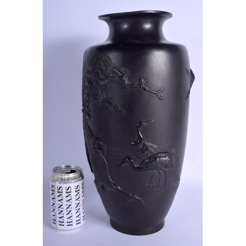 1437 - A GOOD LARGE 19TH CENTURY JAPANESE MEIJI PERIOD BRONZE VASE by Chikafusa, decorated in relief with c... 