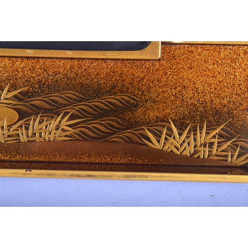 1481 - A MAJESTIC 18TH/19TH CENTURY JAPANESE EDO PERIOD GOLD LACQUER SUZURIBAKO decorated in relief with fl... 