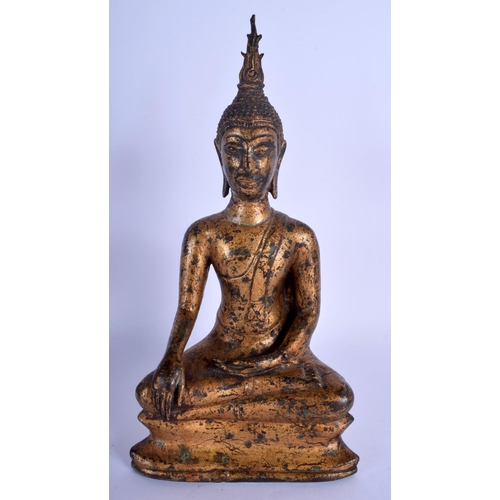 1643 - A 19TH CENTURY SOUTH EAST ASIAN THAI GILT BUDDHA modelled upon a triangular base. 30 cm x 12 cm.