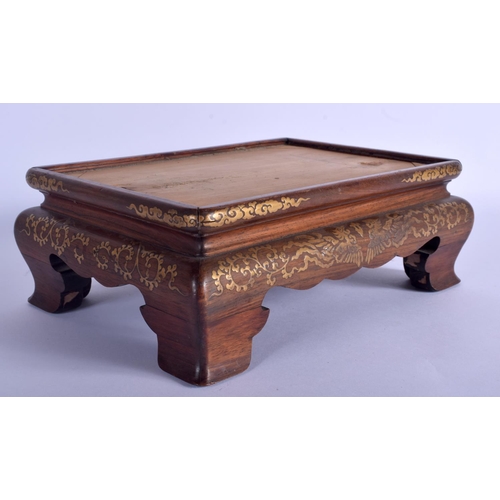 1647 - A 19TH CENTURY JAPANESE MEIJI PERIOD GOLD LACQUER HARDWOOD STAND decorated with scrolling foliage. 2... 