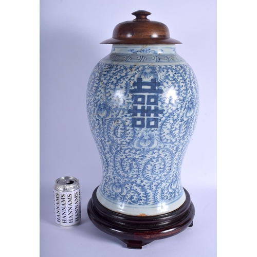 1648 - A LARGE 19TH CENTURY CHINESE BLUE AND WHITE PORCELAIN GINGER JAR Qing, painted with flowers. Vase 33... 