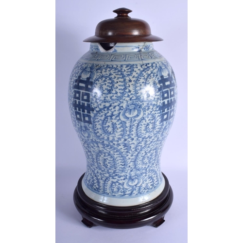 1648 - A LARGE 19TH CENTURY CHINESE BLUE AND WHITE PORCELAIN GINGER JAR Qing, painted with flowers. Vase 33... 