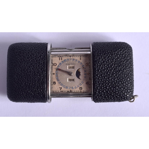 1799A - A VERY RARE EARLY 20TH CENTURY MOVADO SHAGREEN CASED TRAVELLING WATCH with unusual calendar and moon... 