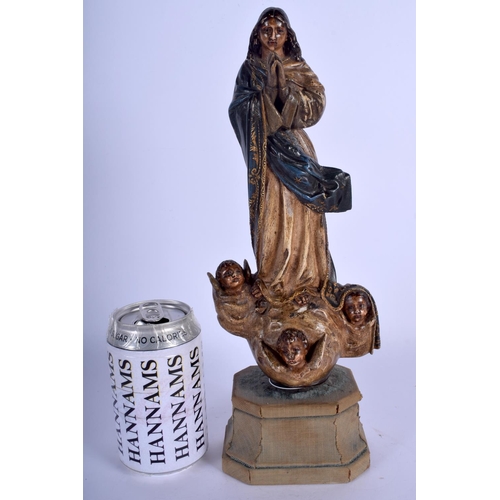 2352 - A LARGE 18TH CENTURY SOUTHERN EUROPEAN CARVED POLYCHROMED WOOD SAINT upon a velvet base. 33 cm high.