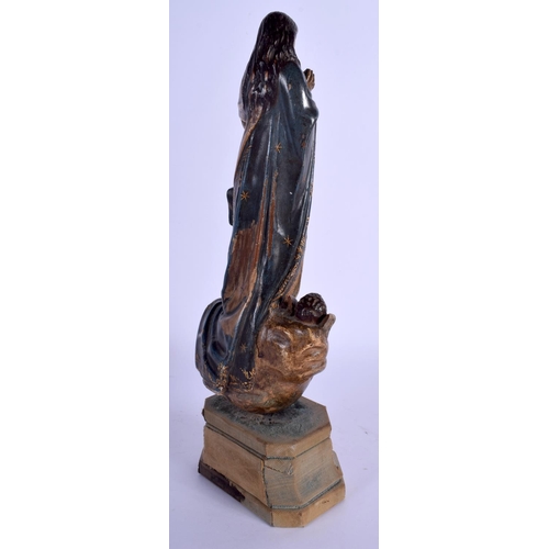 2352 - A LARGE 18TH CENTURY SOUTHERN EUROPEAN CARVED POLYCHROMED WOOD SAINT upon a velvet base. 33 cm high.