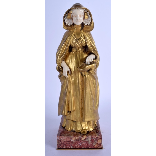 2353 - A 19TH CENTURY FRENCH ART NOUVEAU GILT BRONZE AND IVORY FIGURE OF A FEMALE modelled holding a pair o... 