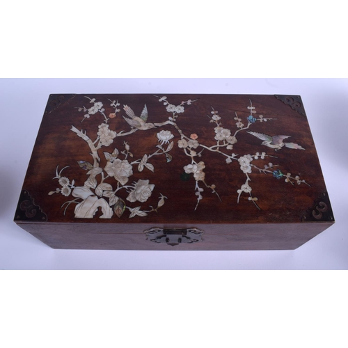 1005 - AN EARLY 20TH CENTURY CHINESE HONGMU HARDWOOD CASKET Late Qing, decorated with birds and foliage. 35... 