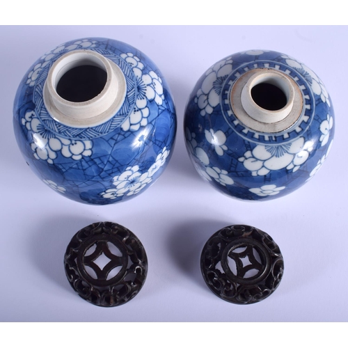 1008 - A NEAR PAIR OF 17TH CENTURY CHINESE BLUE AND WHITE GINGER JARS Kangxi, painted with prunus and flowe... 