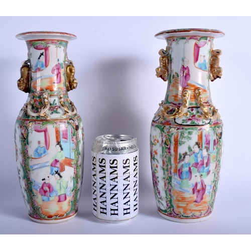 1021 - A NEAR PAIR OF 19TH CENTURY CHINESE CANTON FAMILLE ROSE VASES Qing. 26 cm high.