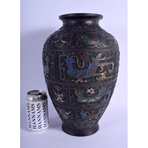 1042 - A LARGE 19TH CENTURY CHINESE CHAMPLEVE ENAMEL BRONZE VASE decorated with birds and taotie mask heads... 