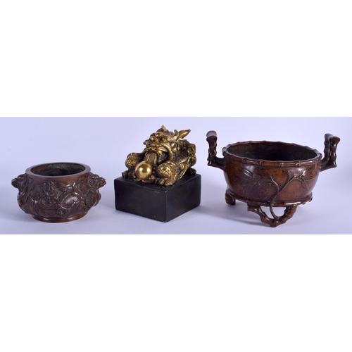 1053 - A CHINESE TWIN HANDLED BAMBOO FORM BRONZE CENSER 20th Century, together with a censer & seal. Larges... 