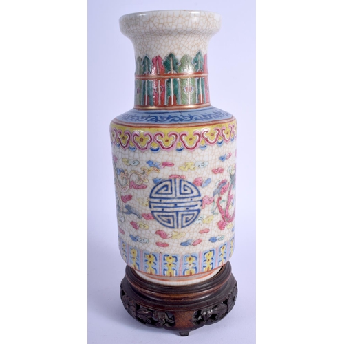 1077 - A 19TH CENTURY CHINESE FAMILLE ROSE PORCELAIN VASE Qing, painted with dragons. 22 cm high.