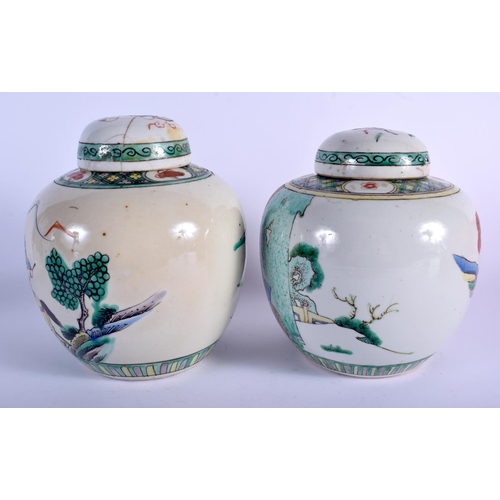 1084 - A PAIR OF 19TH CENTURY CHINESE FAMILLE VERTE GINGER JARS AND COVER painted with warriors. 19 cm x 12... 