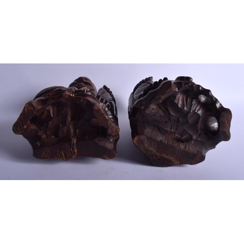 1091 - A PAIR OF 19TH CENTURY CHINESE CARVED HARDWOOD BUDDHA Qing. 24 cm x 10 cm.