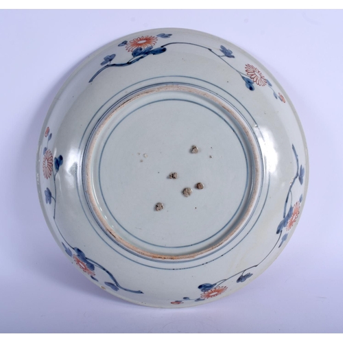 1100 - AN 18TH CENTURY JAPANESE EDO PERIOD IMARI DISH painted with flowers and Buddhistic lions. 28 cm diam... 