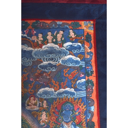 1126 - A 19TH CENTURY CHINESE SINO TIBETAN EMBROIDERED SILK THANGKA painted with Buddhistic figures. Thangk... 