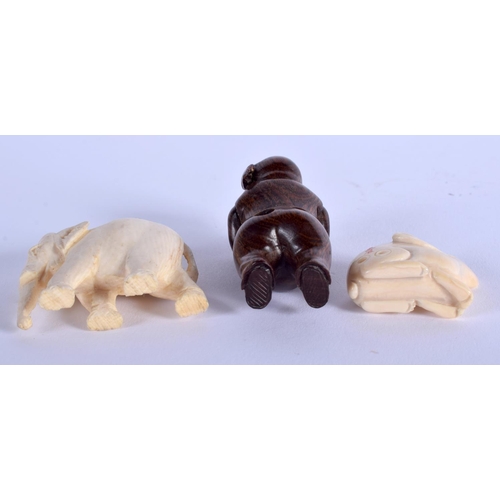 1139 - AN EARLY 20TH CENTURY JAPANESE MEIJI PERIOD IVORY RABBIT NETSUKE together with two others. Largest 3... 